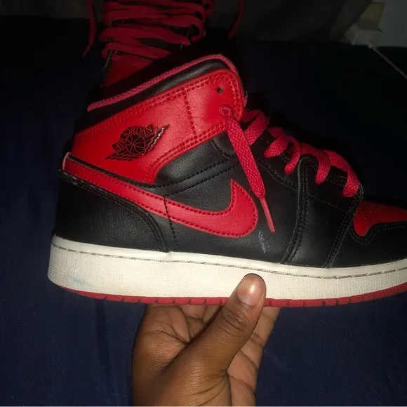 These are Jordan 1mid”Black/Fire Red/white shoes size 5.5