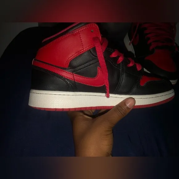 These are Jordan 1mid”Black/Fire Red/white shoes size 5.5