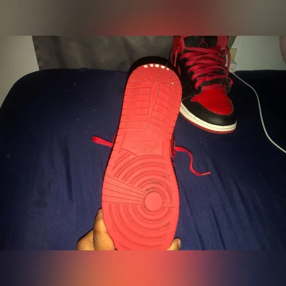 These are Jordan 1mid”Black/Fire Red/white shoes size 5.5