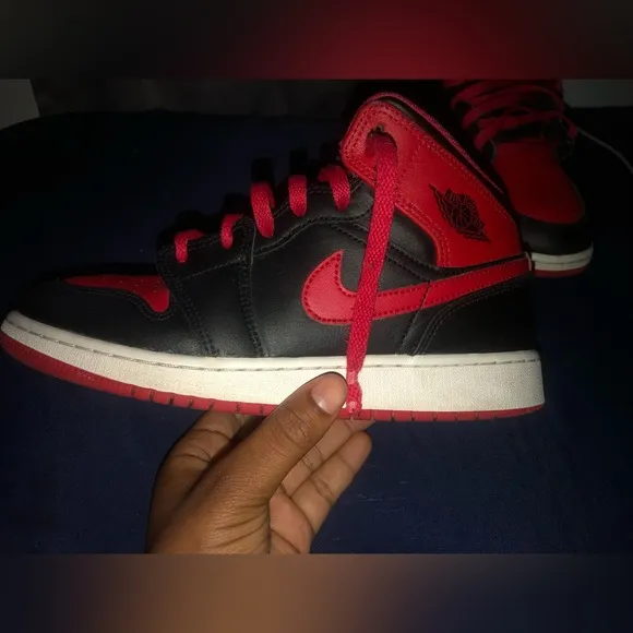 These are Jordan 1mid”Black/Fire Red/white shoes size 5.5